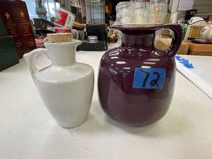 lot 72 image: Frankoma deep purple pitcher medium, frankoma white pitcher small. both with corks.