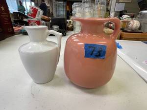 lot 73 image: Frankoma Peach medium pitcher, frankoma white pitcher small. no corks.