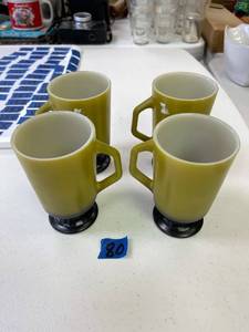 lot 80 image: Fire king green and black footed hot chocolate mugs, QTY 4