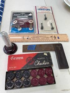 lot 100 image: misc lot, temperature gauge, rulers, red wagon, plastic checkers, life like street lamps