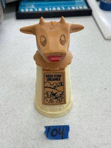 lot 104 image: plastic moo cow creamer