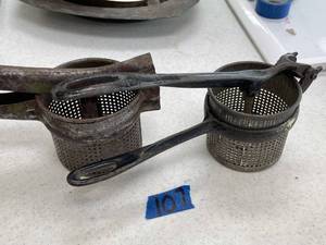 lot 107 image: pair of strainers