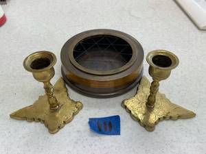 lot 111 image: bronze dish, brass candle stick holders.