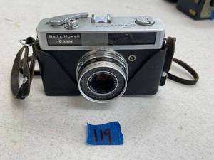 lot 119 image: Bell and howell canon camera, partial case.