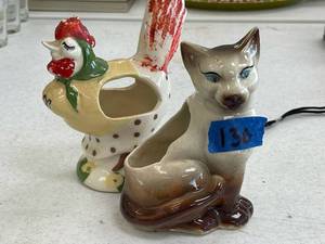 lot 130 image: Unmarked rooster planter, cat planter.