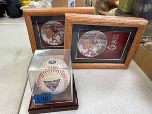 lot 140 image: Joe Montana framed plates 2, signed baseball unknown if authentic.