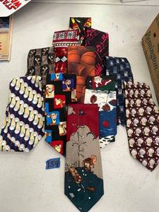 lot 154 image: misc tie lot- 11. gold theme, pepper, tigger, Santa fishing, basketball and more.