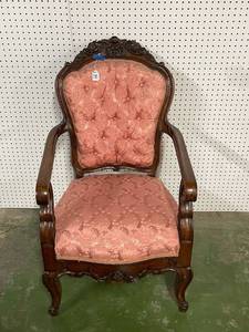 lot 184 image: Antique carved wood Captains chair, with arm rest. quilted plush backing and cushion seat.