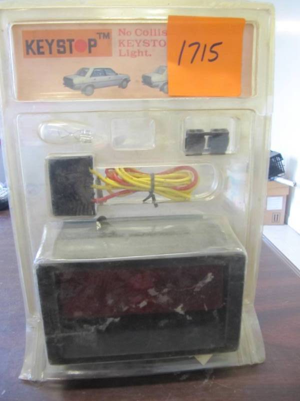 lot 1715 image: KEYSTOP  NO COLLISON BRAKE LIGHT UNUSED IN BOX