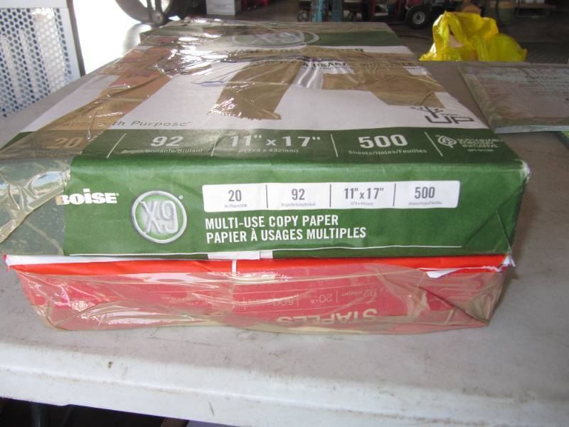 lot 2031 image: 2 Reams of 11 X 17 paper with torn covers  1000 SHEETS