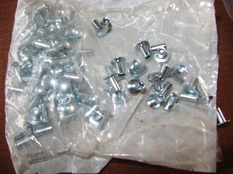lot 2033 image: 90 NEW BUCK RIVETS