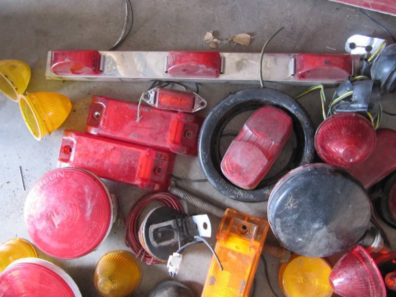 lot 2071 image: BOX OF TAIL LIGHTS, BRAKE LIGHTS, RED AND AMBER LENS, LIGHT BULBS, RUBBER GROMMETS, & MORE