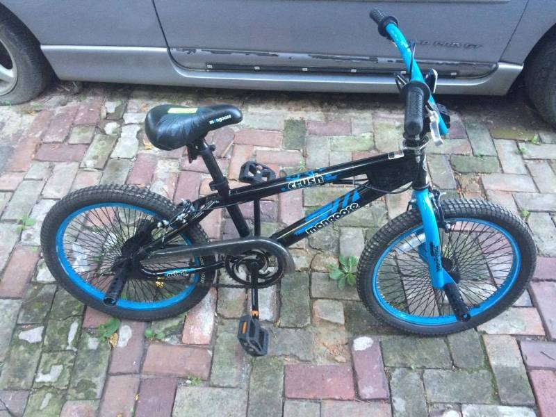 lot 1152 image: MONGOOSE BIKE BLUE AND BLACK