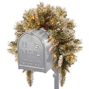 lot 19214 image: National Tree Company Pre-lit Artificial Christmas Mail Box Swag  Flocked with Mixed Decorations and White LED Lights  Glittery Bristle Pine-36 Inch