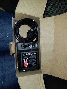 lot 4206 image: kamado joe grill battery charger