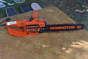 lot 6030 image: 12 Electric Chain Saw  Remington  1.25 HP