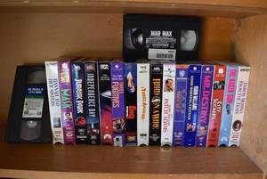 lot 6040 image: Lot of VHS Tapes  Jurassic Park, Independence Day, The Naked Gun, Etc.