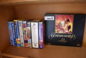 lot 6044 image: Lot of Classic Movies VHS Tapes  Singin in the Rain, The Magnificent Seven, Gone with the Wind, Etc.
