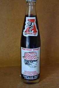 lot 6059 image: Vintage Coke Bottle  Paul Bear Bryant, The Winningest Football Coach in Collegiate History  Coke and the Bear a Winning Pair