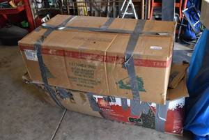 lot 6067 image: Lot of 2 Boxed Up Christmas Trees  Marked 7 ft and 7.5ft
