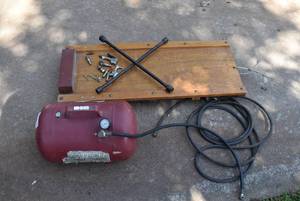 lot 6074 image: Lot of Assorted Car Tools  5 Gallon Air Tank, Wooden Creeper, 4 Way Lug WrenchTire Iron, Etc.