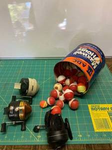 lot 6091 image: Coffee Can Full of Fishing Reels and Bobbers
