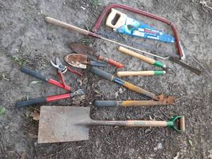 lot 7048 image: Lot of Assorted Garden Tools  Shovels, Saw, Etc.