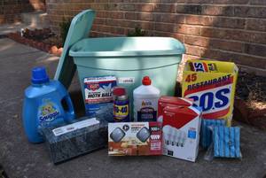 lot 6107 image: Lot of Home and Cleaning Supplies in Plastic Tub  SOS Pads, Light Bulbs, WD-40, Etc.