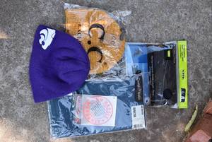 lot 7006 image: Lot of 4 Outdoor Clothing Items  Universal Pack Cover, Performance Base Layer Pant, Hats