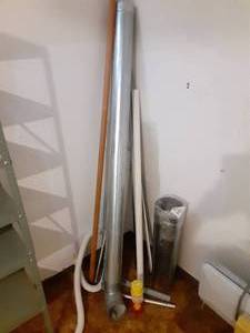 lot 8054 image: Home Repair Destash Lot  Curtain Rods, Ducting, PVC Pipe, Wall Brackets and More
