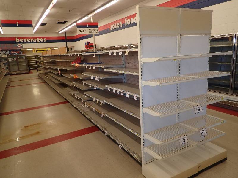 lot 4247 image: Entire Row of Adjustable Double Sided Merchandise Shelving