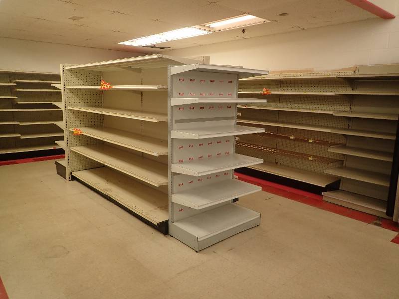 lot 4248 image: Entire Corner of Adjustable Merchandise Shelving