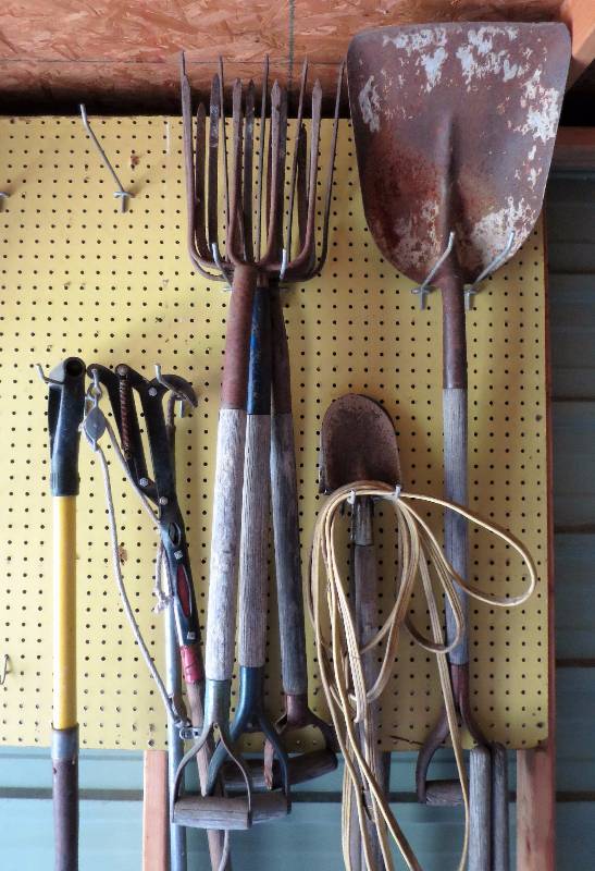 lot 146 image: Wall of Lawn Tools