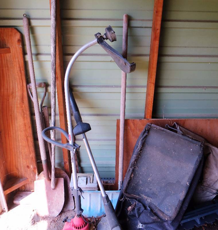 lot 147 image: Wall of Lawn Tools