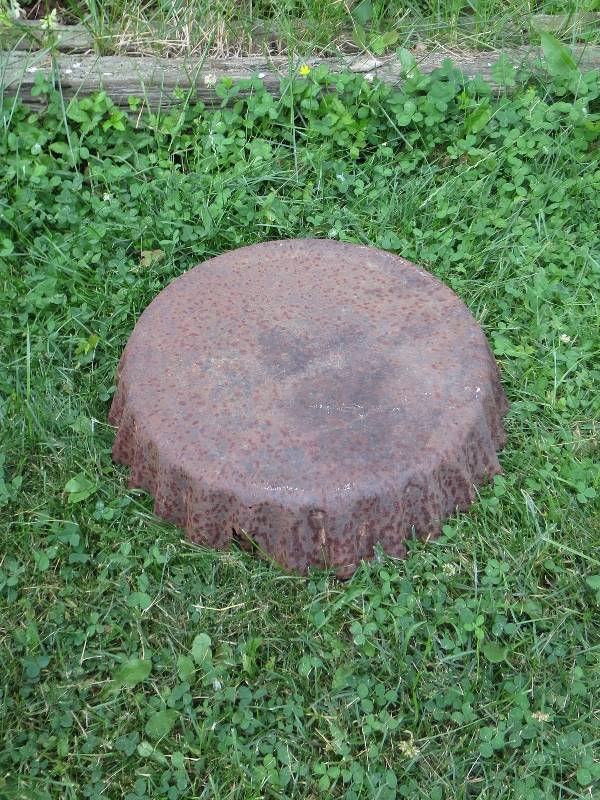 lot 160 image: Huge Bottle Cap Primitive