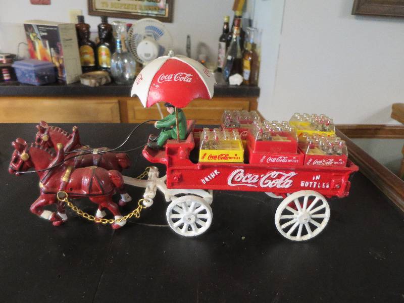 lot 28 image: Cast Iron Coca Cola Collectible