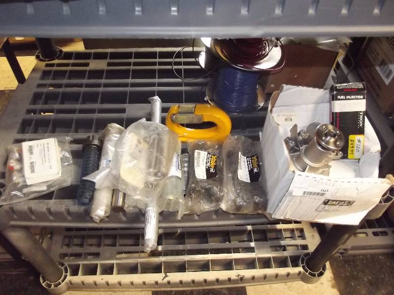 lot 1825 image: Industrial Equipment Parts Komatsu, Cat, Clark and more