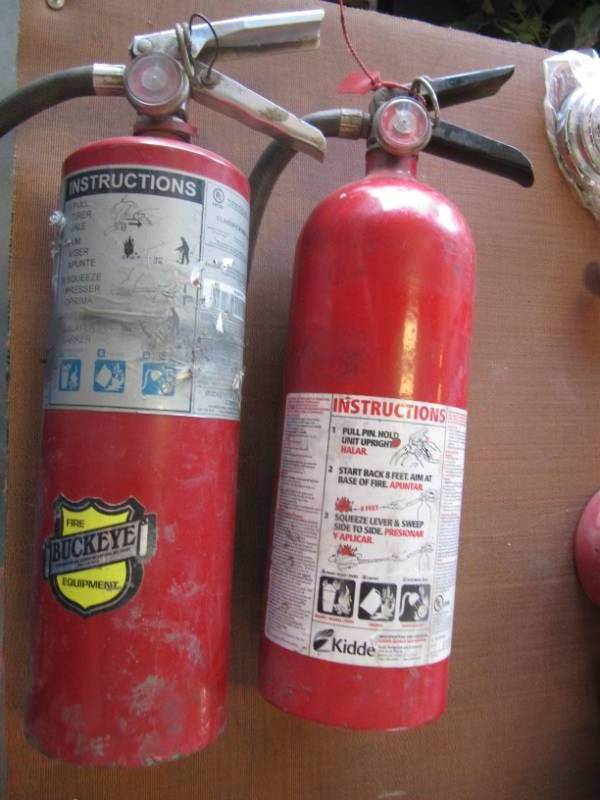 lot 2255 image: 2 FIRE EXTINGUIHERS  8LB.  1 NEEDS CHARGED
