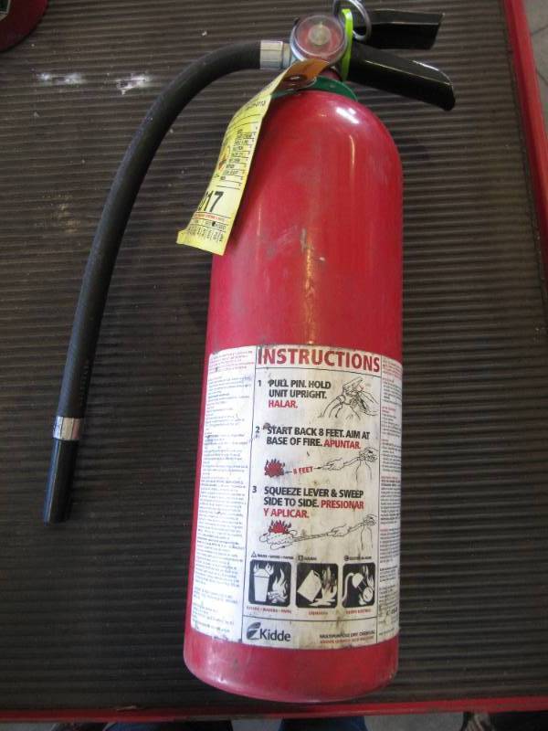 lot 668 image: 8 LB FIRE EXTINGUISHER CHARGED