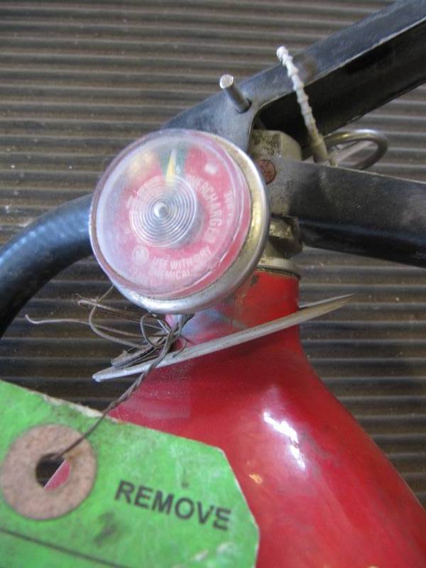 lot 670 image: 8 LB FIRE EXTINGUISHER CHARGED