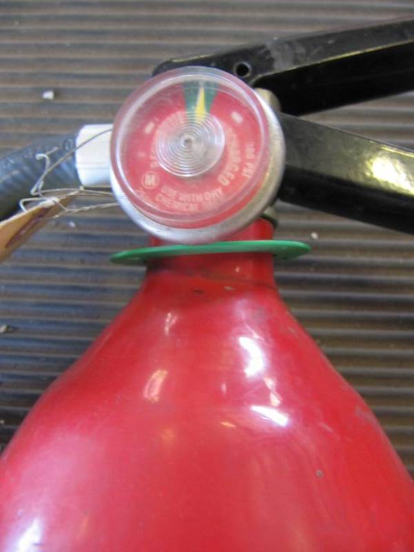 lot 671 image: 8 LB FIRE EXTINGUISHER CHARGED