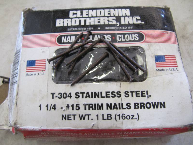 lot 688 image: 1 LB OF STAINLESS STEEL BROWN TRIM NAILS