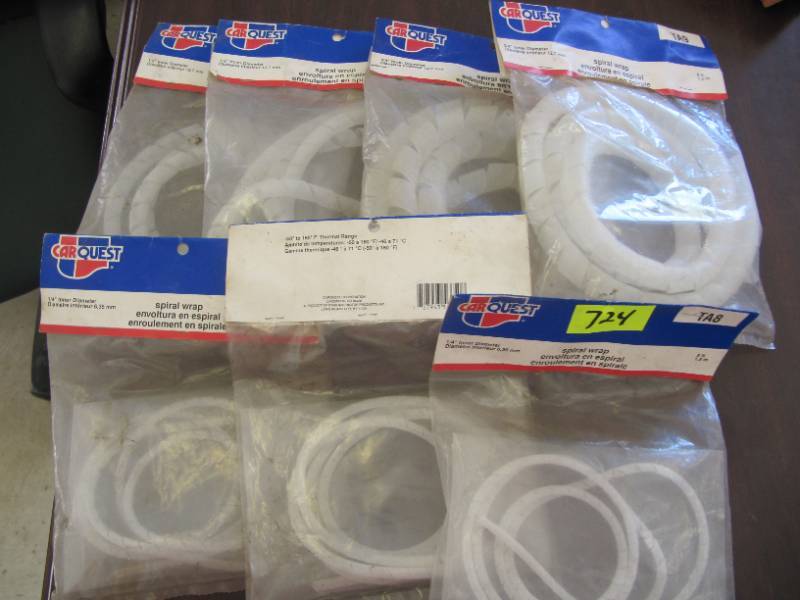 lot 724 image: 7 NEW PACKAGES OF SPIRAL WRAP TA7, TA8, TA9 FOR WRAPPING AND PROTECTING HOSES AND WIRING