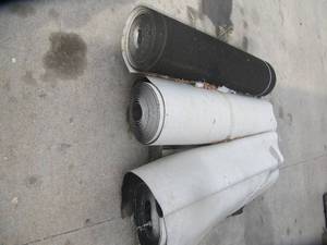 lot 3138 image: 3 LARGE ROLLS OF RUBBER 18 X 4 X   USE FOR TRAILER covering of floors in Utility and Smaller trailers  AND TOOL BOXES