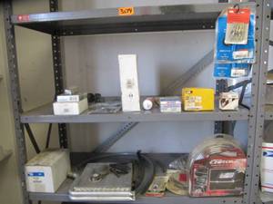 lot 3178 image: EVERYTHING ON 2 SHELFS INCLUDES HOSE SECTIONS, CLUTCH BRAKE, CHROME TRIM