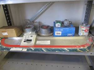 lot 3181 image: ALL PARTS ON SHELF INCLUDES HUB SEAL, HUB CAP, CHROME DOOR TRIM