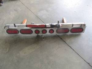 lot 3215 image: ALUMINUM LIGHT BAR EXTENDS TO 8