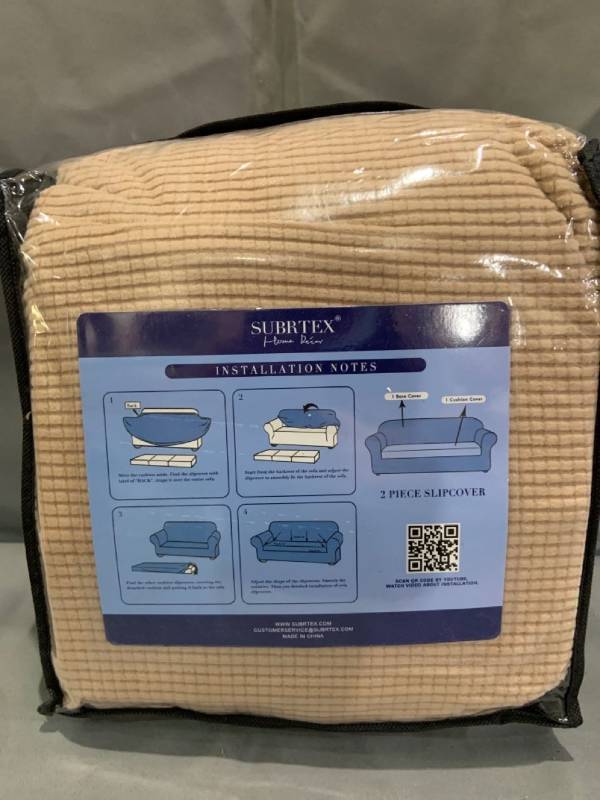 lot 12858 image: Subrtex Home Decor - 2pc Sofa Slip Cover - Camel Brown