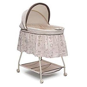 lot 5186 image: Delta Children Deluxe Sweet Beginnings Bedside Bassinet - Portable Crib with Lights and Sounds, Playtime Jungle