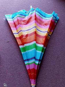 lot 5150 image: Multi-Colored Beach Umbrella unknown make and model